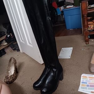 Black leather tall heel boots
